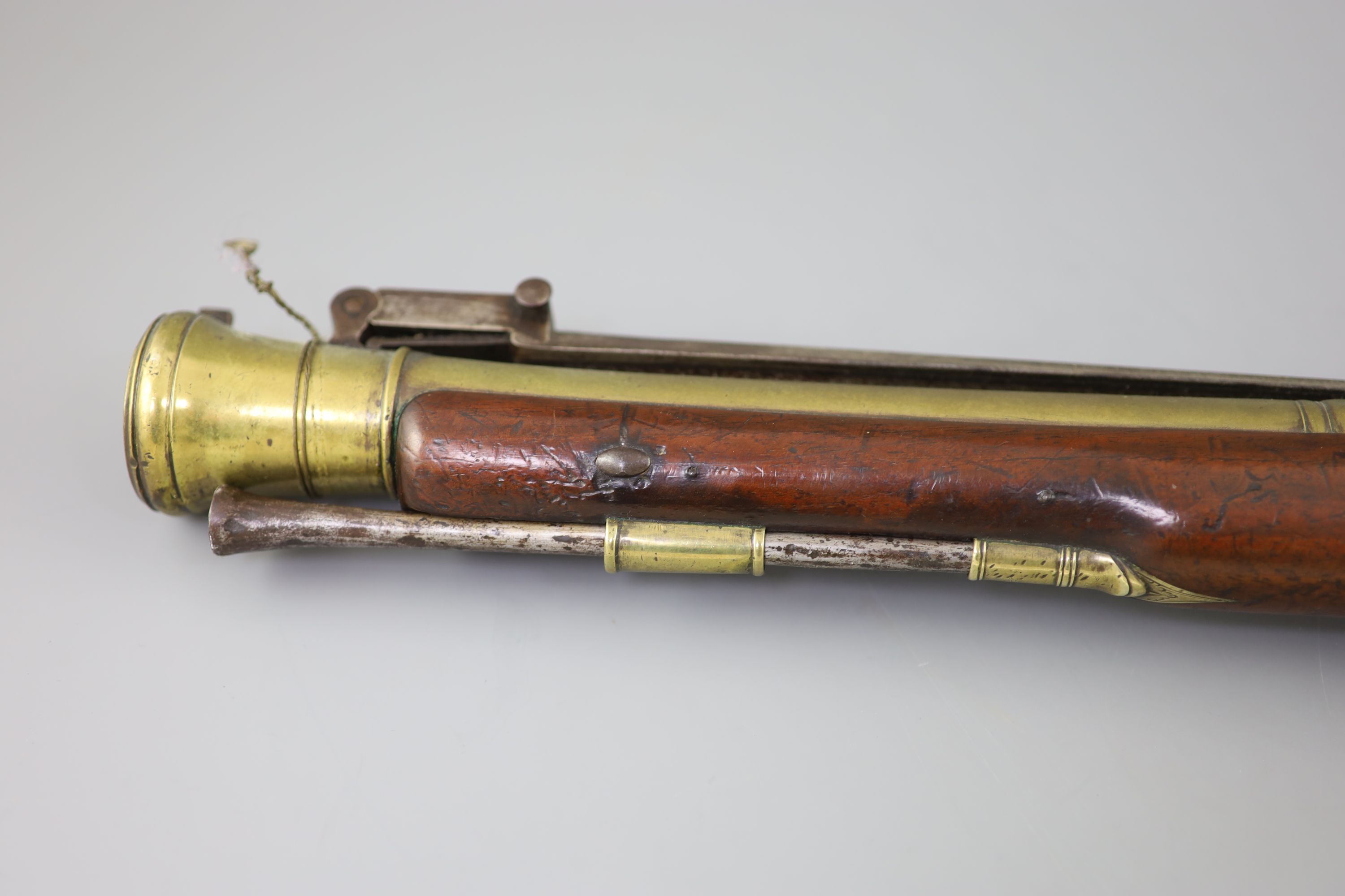 A late 18th century brass barrelled flintlock blunderbuss, by Jones, length 30in.